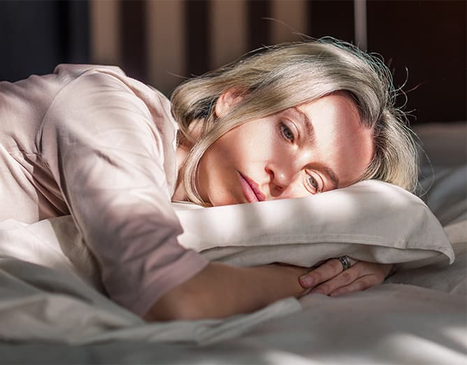 Christina lying on a pillow